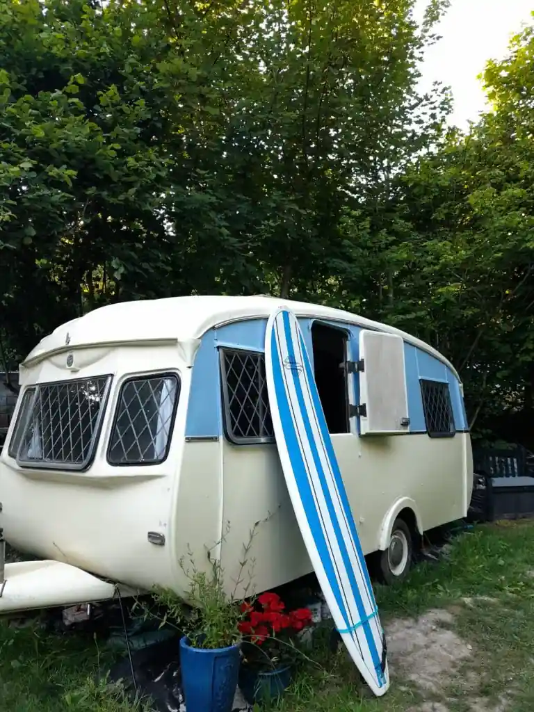 caravan and surfboard